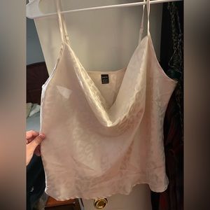 Women’s Shein dressy tank! I would say it’s cropped some but barely been worn.